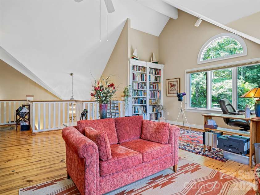212 Plains Drive, Asheville, NC 28803.  MLS# CAR4373676, YatesRealty ID 17089. Loft den with built-ins, architectural windows and design