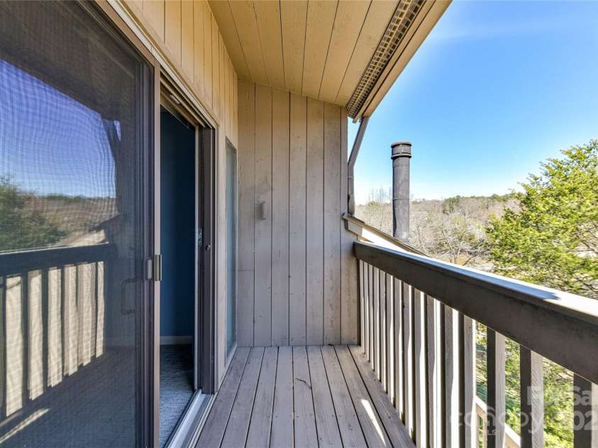 84 Ridgeport Road, Clover, SC 29710.  MLS# CAR4222357, YatesRealty ID 1709. Deck off Primary Suite