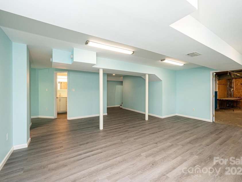 1552 10th Street Place, Hickory, NC 28601.  MLS# CAR4222157, YatesRealty ID 17096. Lower Level Den