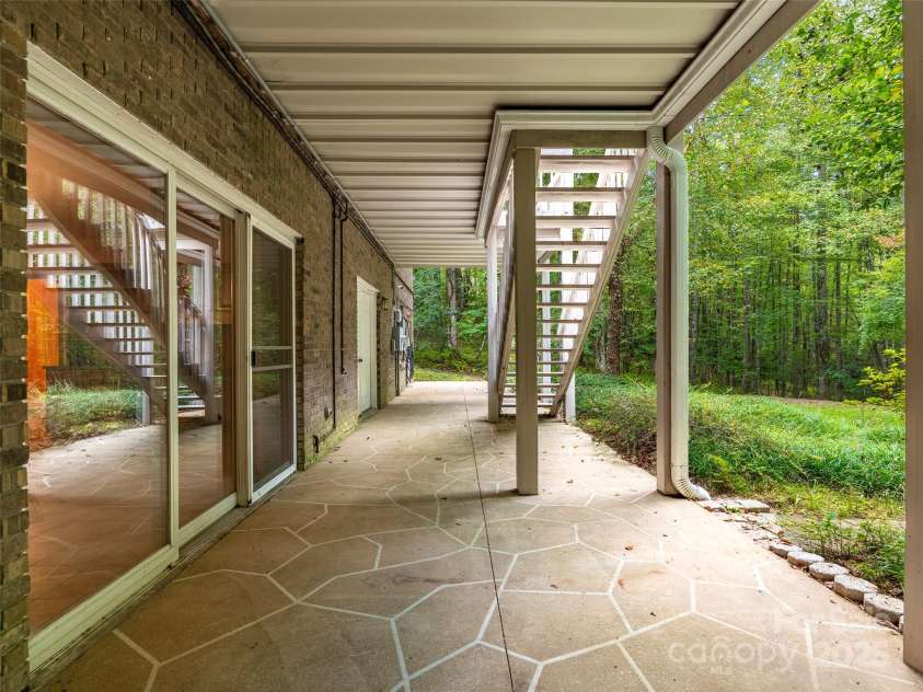 331 Thomas Road, Hendersonville, NC 28739.  MLS# CAR4303956, YatesRealty ID 17099. Covered patio