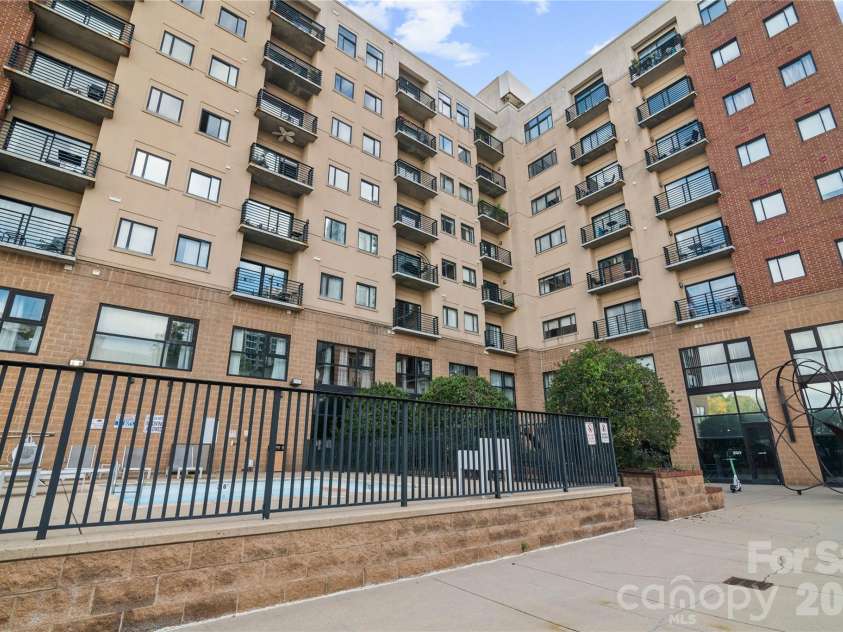 715 Church Street, Charlotte, NC 28202.  MLS# CAR4313109, YatesRealty ID 1710. Pool entertainment area