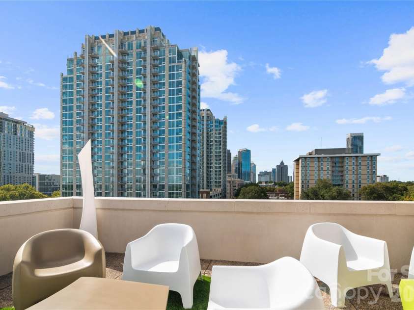 715 Church Street, Charlotte, NC 28202.  MLS# CAR4313109, YatesRealty ID 1710. Rooftop Entertainment Lounge/Skyline Views