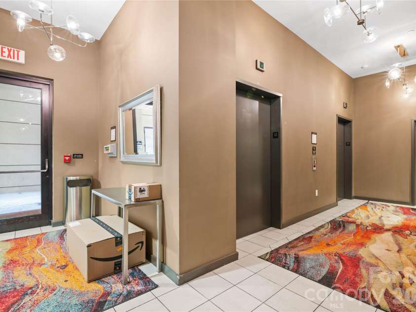 715 Church Street, Charlotte, NC 28202.  MLS# CAR4313109, YatesRealty ID 1710. Secured Private Residence Elevators