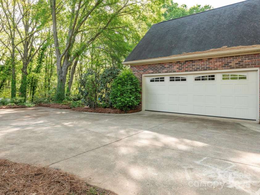 3815 Glen Haven Drive, Concord, NC 28027.  MLS# CAR4246177, YatesRealty ID 17104. Detached 2-car garage plus attached 2-car garage