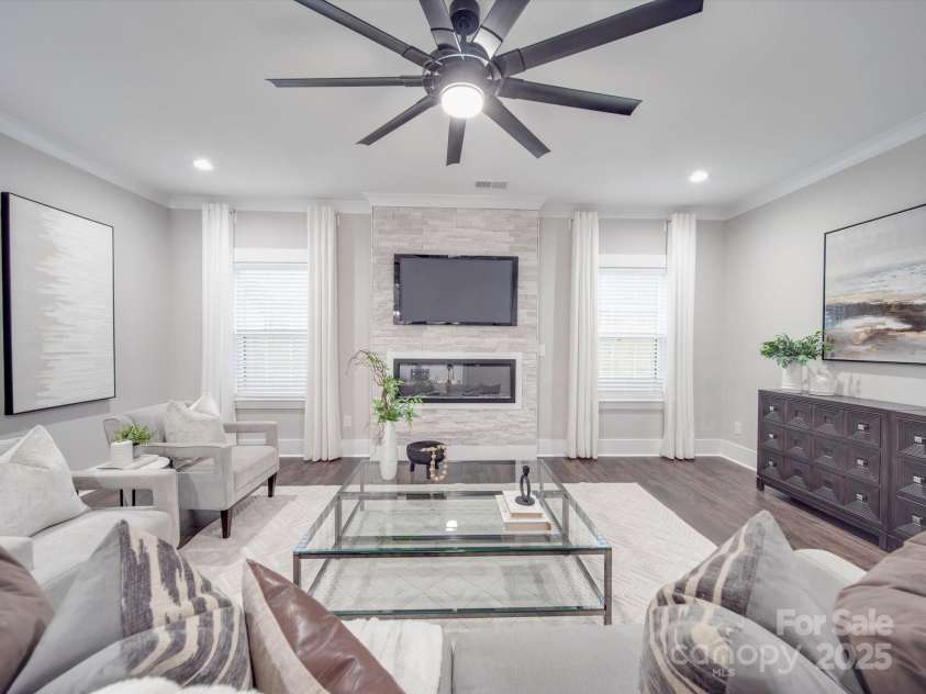 1304 Pleasant Plains Road, Matthews, NC 28105.  MLS# CAR4207949, YatesRealty ID 17105. Photo Representation Staged no fireplace at 1304 pleasant plains* no fireplace