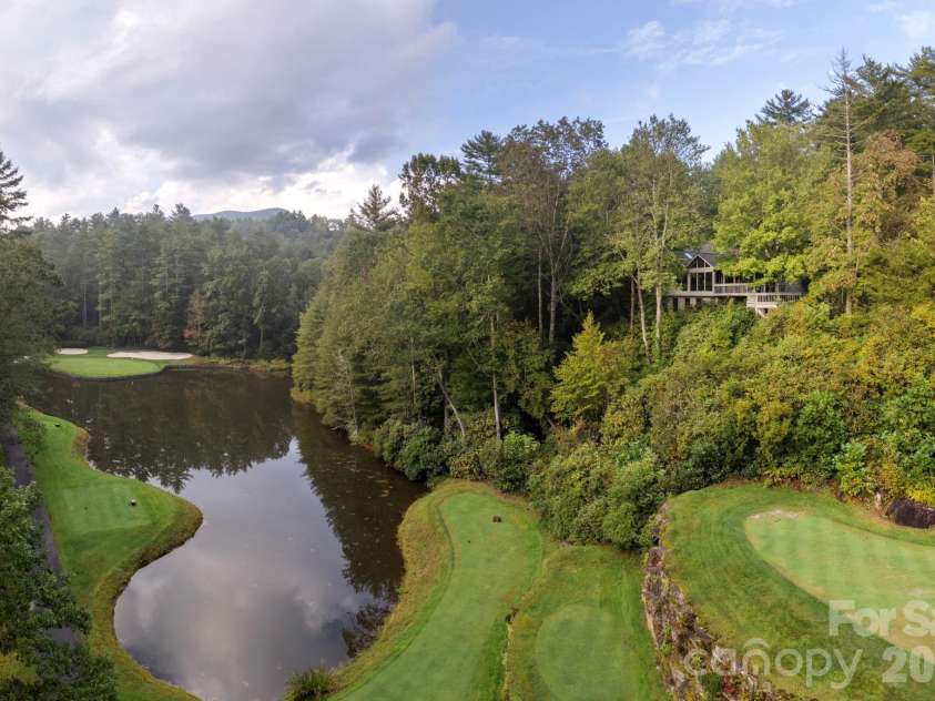 940 Winding Creek Road, Sapphire, NC 28774.  MLS# CAR4352136, YatesRealty ID 17105. 