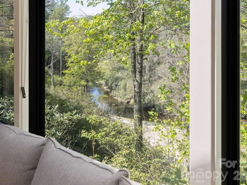940 Winding Creek Road, Sapphire, NC 28774.  MLS# CAR4352136, YatesRealty ID 17105. 
