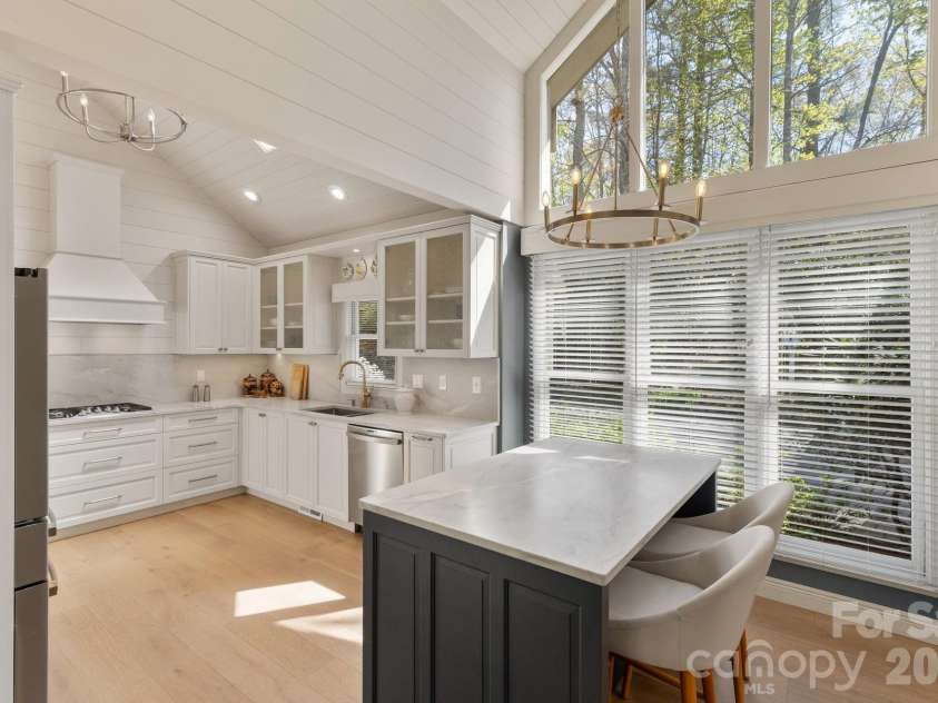 940 Winding Creek Road, Sapphire, NC 28774.  MLS# CAR4352136, YatesRealty ID 17105. 