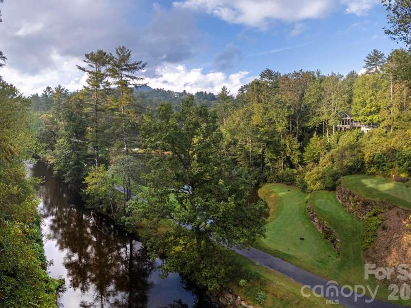 940 Winding Creek Road, Sapphire, NC 28774.  MLS# CAR4352136, YatesRealty ID 17105. 