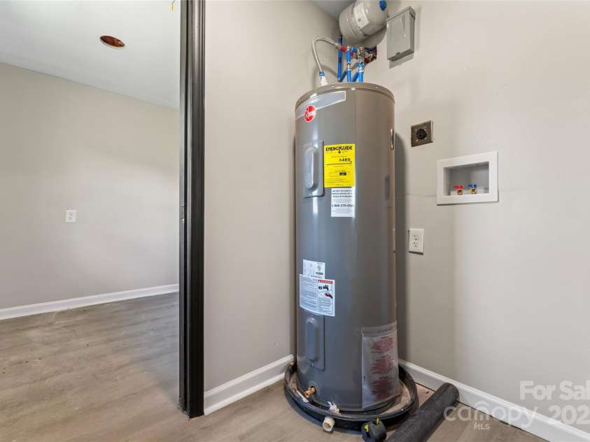 5704 Indian Trail Fairview Road, Indian Trail, NC 28079.  MLS# CAR4251613, YatesRealty ID 17110. Brand new water heater with hookups for washer/dryer