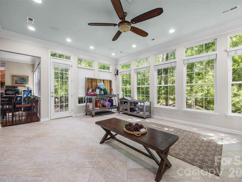 2201 Trading Ford Drive, Waxhaw, NC 28173.  MLS# CAR4374708, YatesRealty ID 17111. Sunroom & door to deck