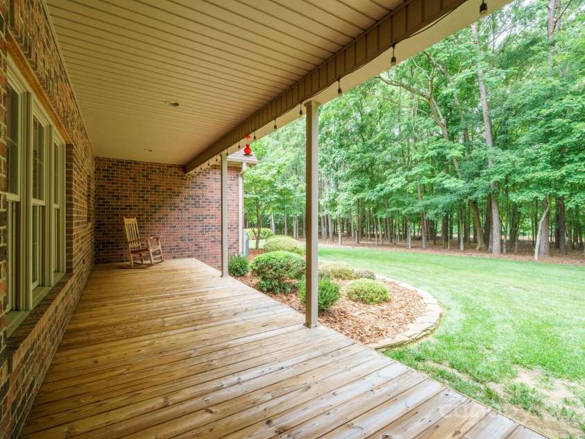 270 North Street, Salisbury, NC 28147.  MLS# CAR4260623, YatesRealty ID 17113. Covered Back Porch Overlooking Wooded Farmland Preservation