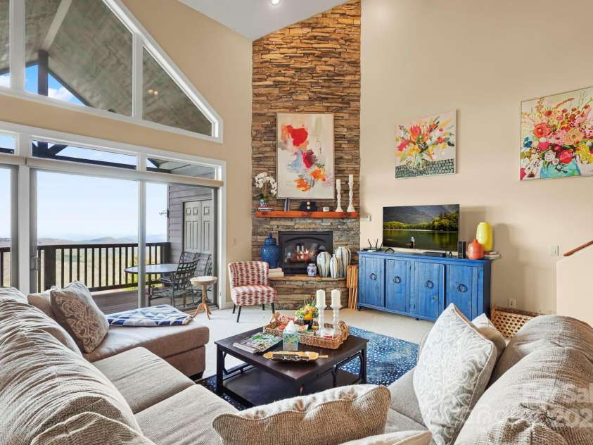 143 Wildflower Lane, Sugar Mountain, NC 28604.  MLS# CAR4256930, YatesRealty ID 17119. Stone Propane Fireplace