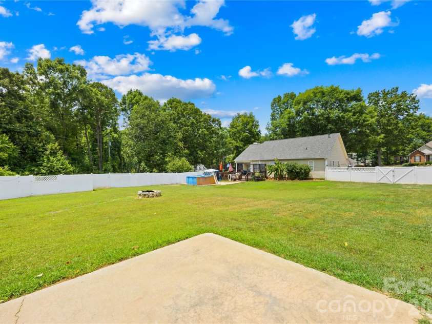105 Laura Court, Cherryville, NC 28021.  MLS# CAR4341809, YatesRealty ID 17120. Slab & firepit