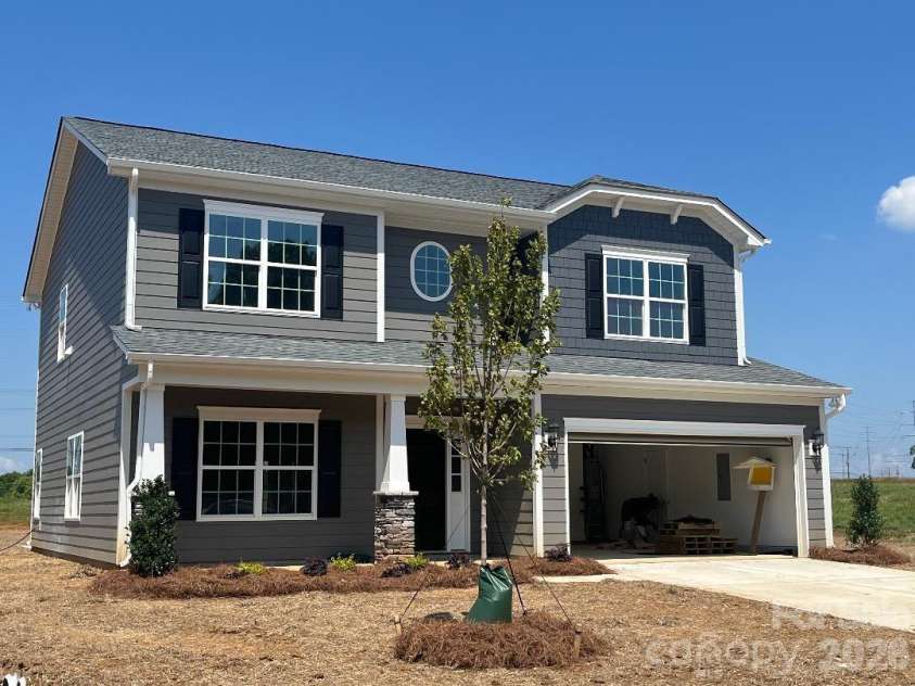 248 Corrie Ann Drive, Concord, NC 28027.  MLS# CAR4371366, YatesRealty ID 17125. Beautiful 5 BR 3 1/2 BA w/Main Level Inlaw Suite