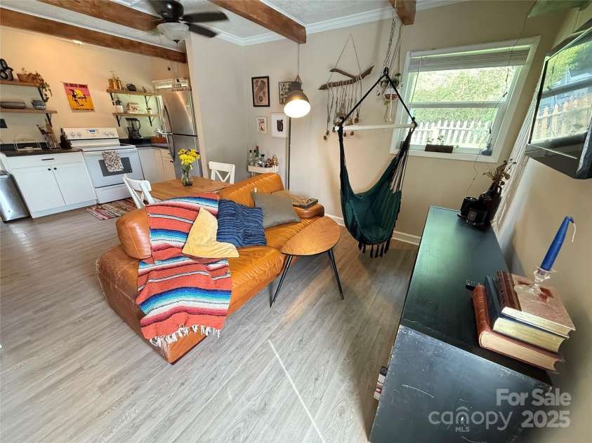 1 Fullam Drive, Arden, NC 28704.  MLS# CAR4263674, YatesRealty ID 17133. Living Room looking into kitchen
