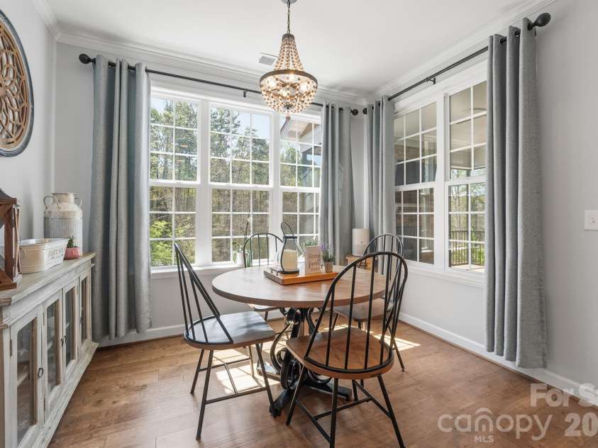 2427 Baxter Place, Concord, NC 28025.  MLS# CAR4365548, YatesRealty ID 17141. Breakfast area with a wooded view. 