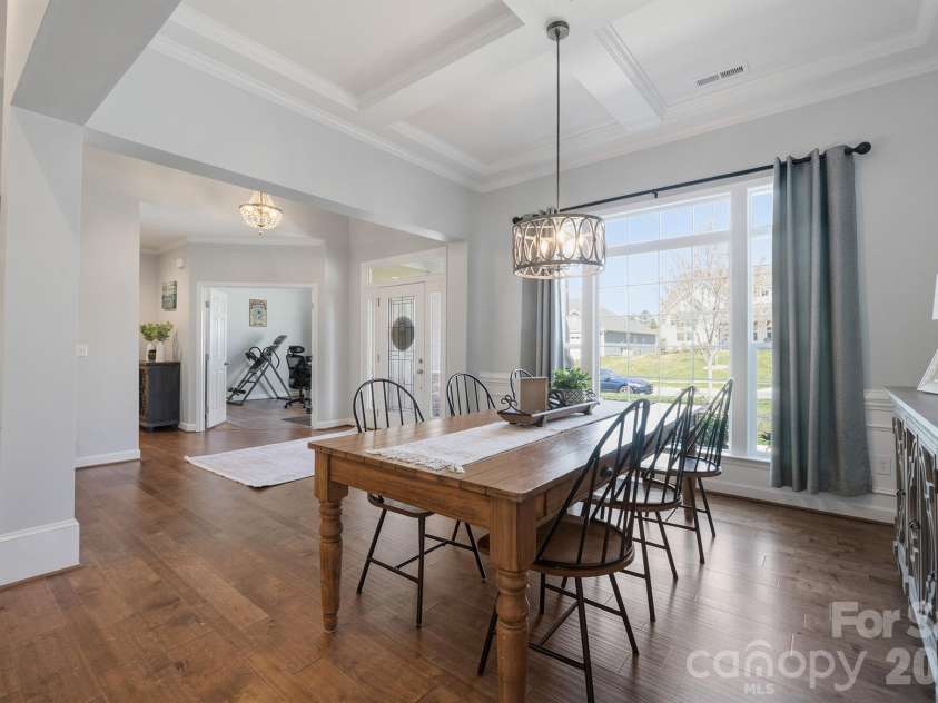 2427 Baxter Place, Concord, NC 28025.  MLS# CAR4365548, YatesRealty ID 17141. Formal dining room with plenty of room for a farm table. 