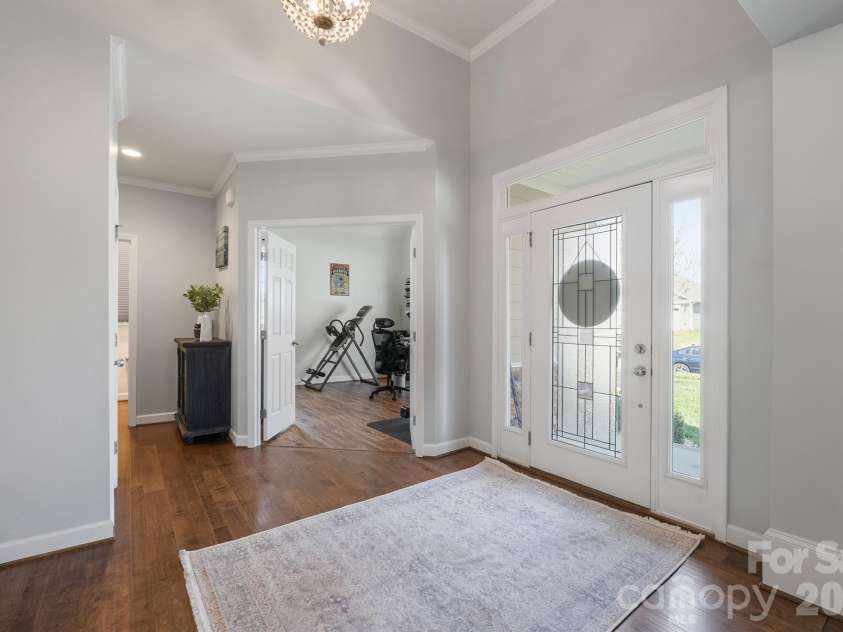 2427 Baxter Place, Concord, NC 28025.  MLS# CAR4365548, YatesRealty ID 17141. Foyer looking into the office.