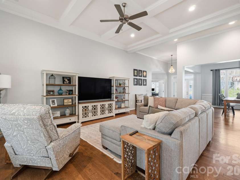2427 Baxter Place, Concord, NC 28025.  MLS# CAR4365548, YatesRealty ID 17141. Great room with 12 ft coffered ceiling