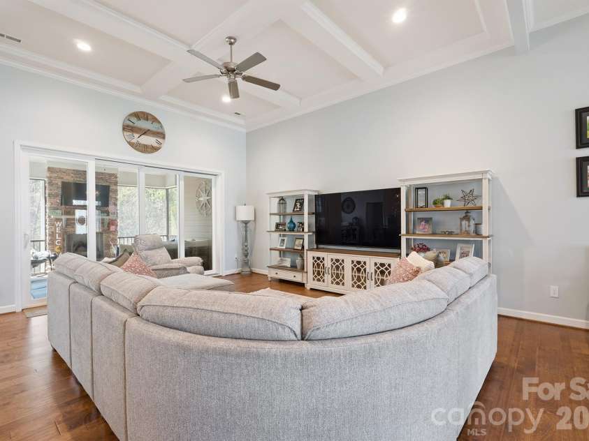 2427 Baxter Place, Concord, NC 28025.  MLS# CAR4365548, YatesRealty ID 17141. Great room with 12 ft coffered ceiling