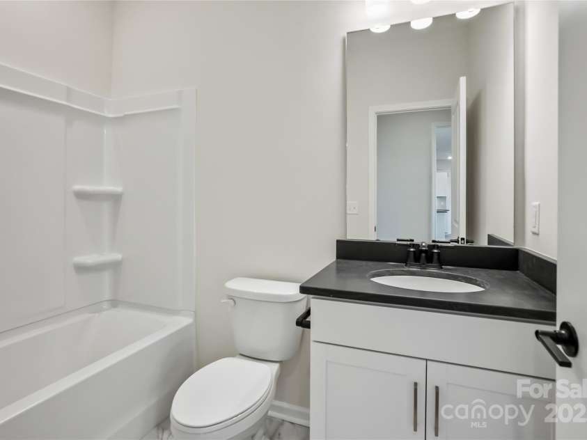 15004 Meadows Hunt Lane, Huntersville, NC 28078.  MLS# CAR4256017, YatesRealty ID 17147. Main Level Full Bathroom