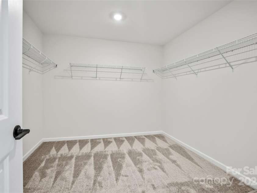 15004 Meadows Hunt Lane, Huntersville, NC 28078.  MLS# CAR4256017, YatesRealty ID 17147. Primary Suite Walk In Closet