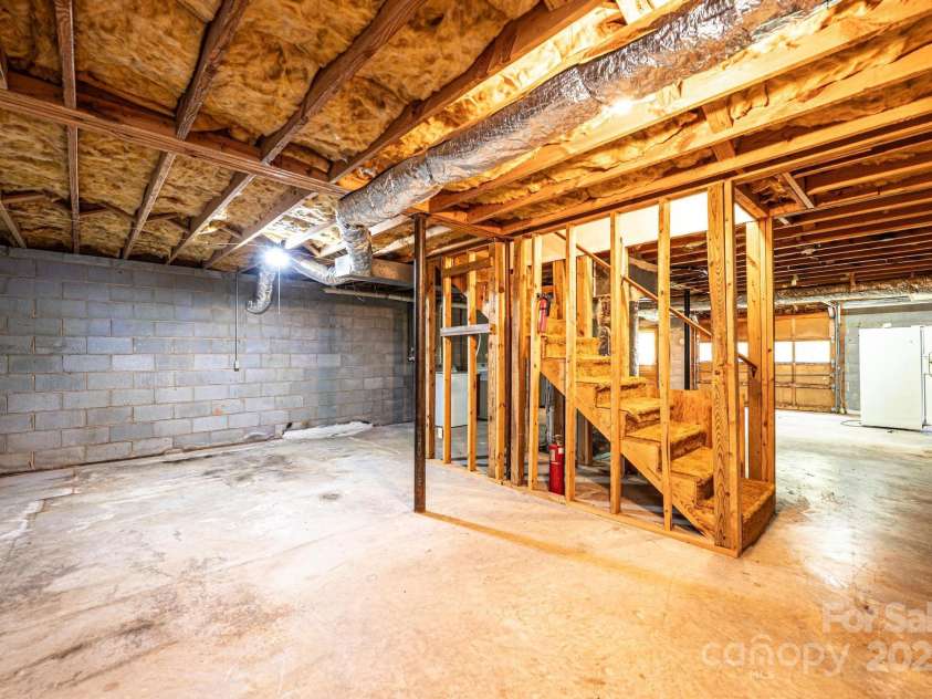 3781 Dover Street, Claremont, NC 28610.  MLS# CAR4280590, YatesRealty ID 17147. Unfinished bsmt