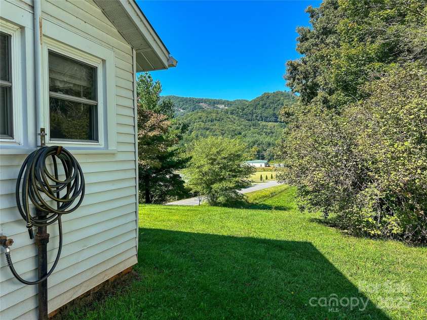 241 Canada Road, Tuckasegee, NC 28783.  MLS# CAR4297878, YatesRealty ID 1715. 
