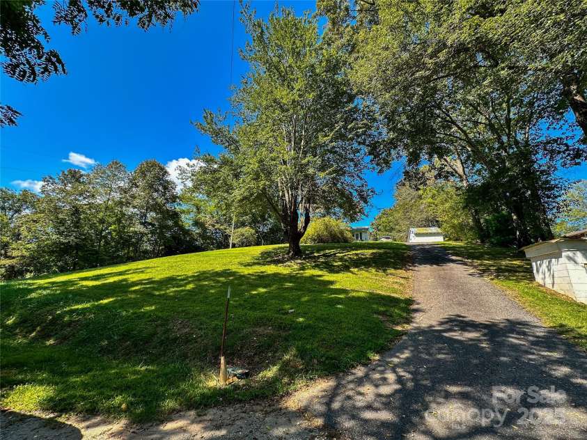 241 Canada Road, Tuckasegee, NC 28783.  MLS# CAR4297878, YatesRealty ID 1715. 