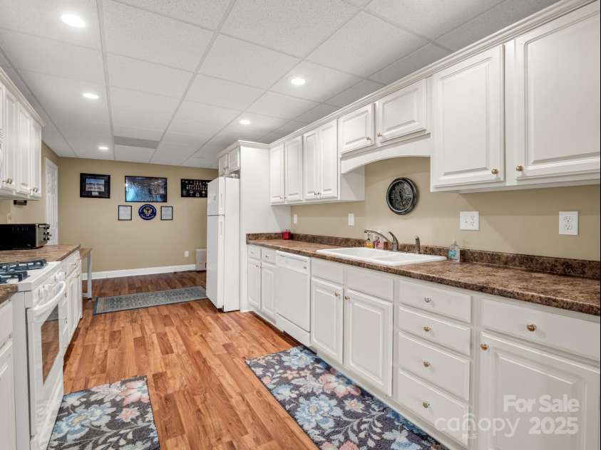 262 Woodridge Drive, Rutherfordton, NC 28139.  MLS# CAR4258071, YatesRealty ID 17150. Lower Level Kitchen