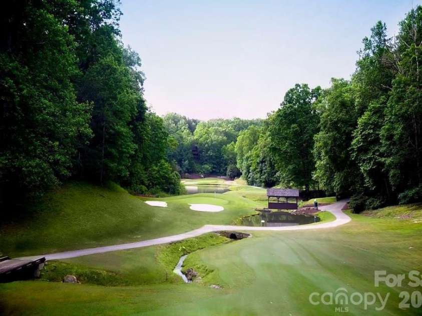 222 West Lake Drive, Lake Lure, NC 28746.  MLS# CAR4294335, YatesRealty ID 17160. Bald Mnt Golf Course