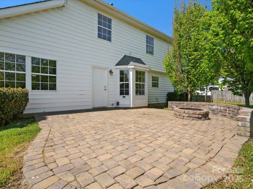 3002 Fair Meadows Drive, Monroe, NC 28110.  MLS# CAR4247552, YatesRealty ID 17166. Paver patio
