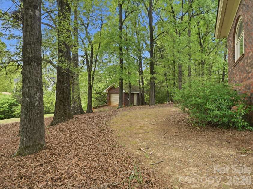 1215 Rosa Drive, Monroe, NC 28112.  MLS# CAR4366917, YatesRealty ID 17172. Additional detached garage for boat, golf cart, storage, workshop. Has electricity.