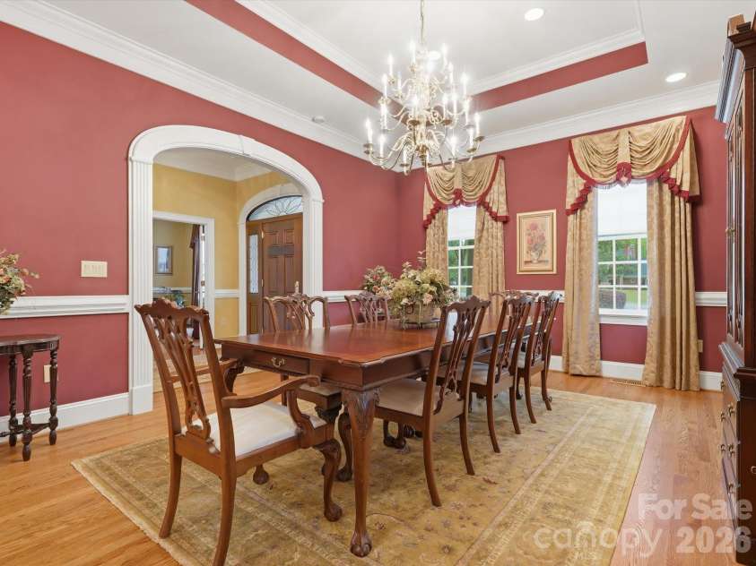 1215 Rosa Drive, Monroe, NC 28112.  MLS# CAR4366917, YatesRealty ID 17172. Dining room with tray ceiling. Extensive molding