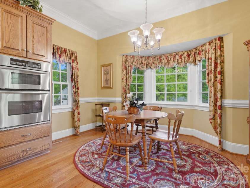 1215 Rosa Drive, Monroe, NC 28112.  MLS# CAR4366917, YatesRealty ID 17172. Kitchen breakfast area, microwave/ oven combo