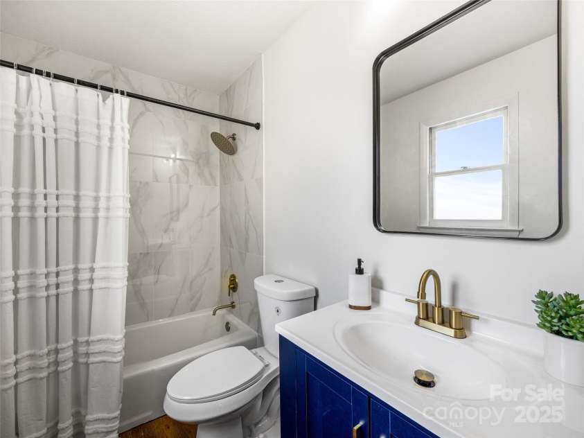 3 Acorn Road, Asheville, NC 28804.  MLS# CAR4277368, YatesRealty ID 17174. Primary suite bathroom.
