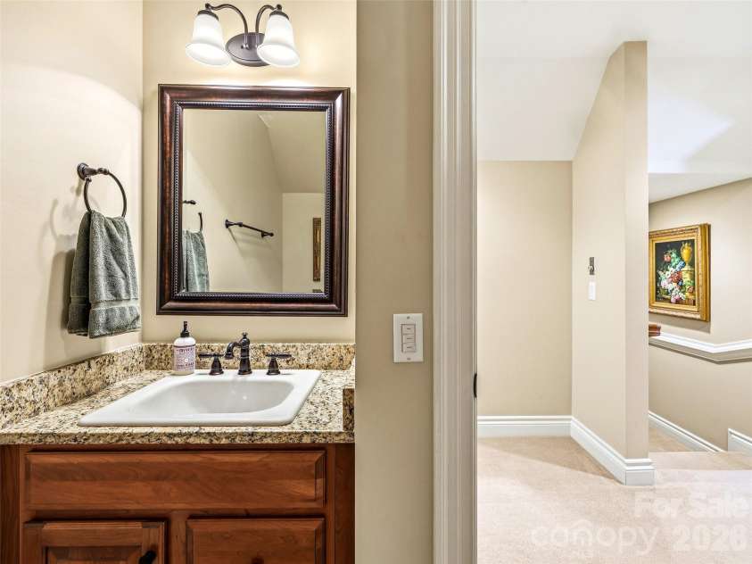 33 Tiverton Lane, Asheville, NC 28803.  MLS# CAR4370215, YatesRealty ID 17174. The second floor has a full bath between the two bedrooms.