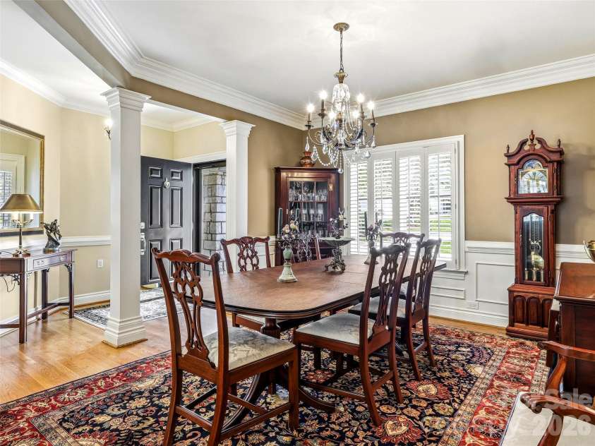 33 Tiverton Lane, Asheville, NC 28803.  MLS# CAR4370215, YatesRealty ID 17174. The spacious dining room accommodates seating for twelve.