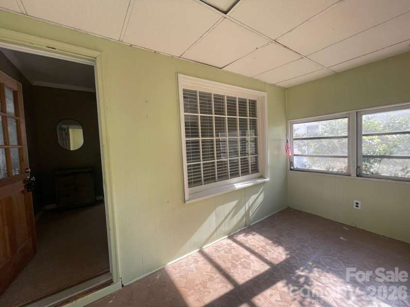 119 Pine Street, Badin, NC 28009.  MLS# CAR4374357, YatesRealty ID 17177. Enclosed Porch