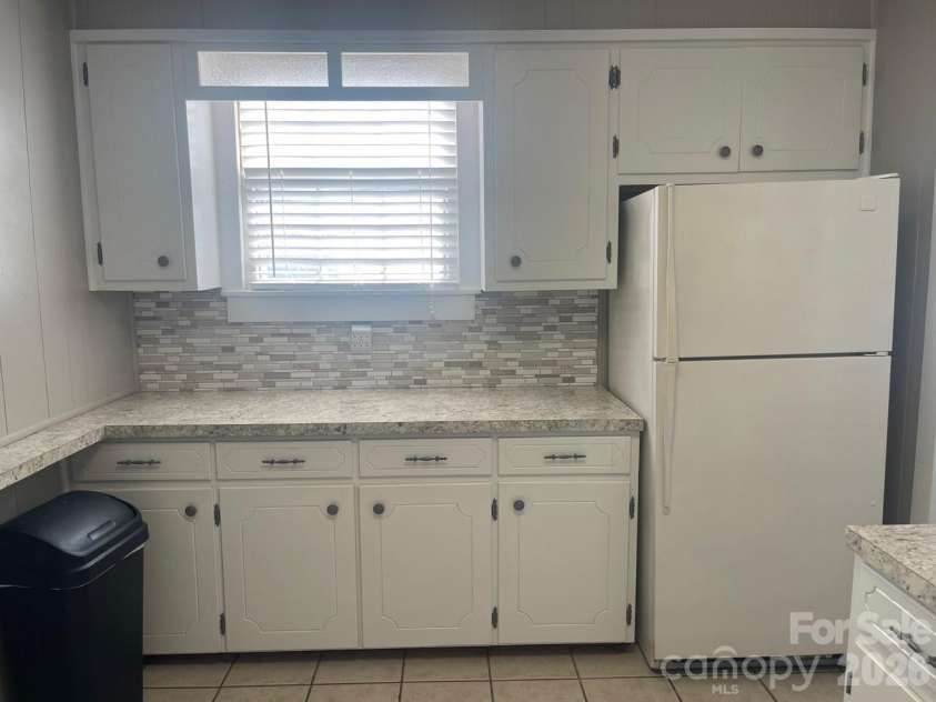 119 Pine Street, Badin, NC 28009.  MLS# CAR4374357, YatesRealty ID 17177. Kitchen