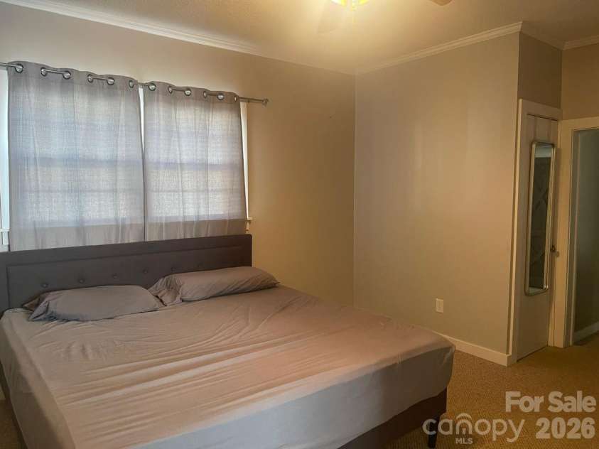 119 Pine Street, Badin, NC 28009.  MLS# CAR4374357, YatesRealty ID 17177. Primary Bedroom