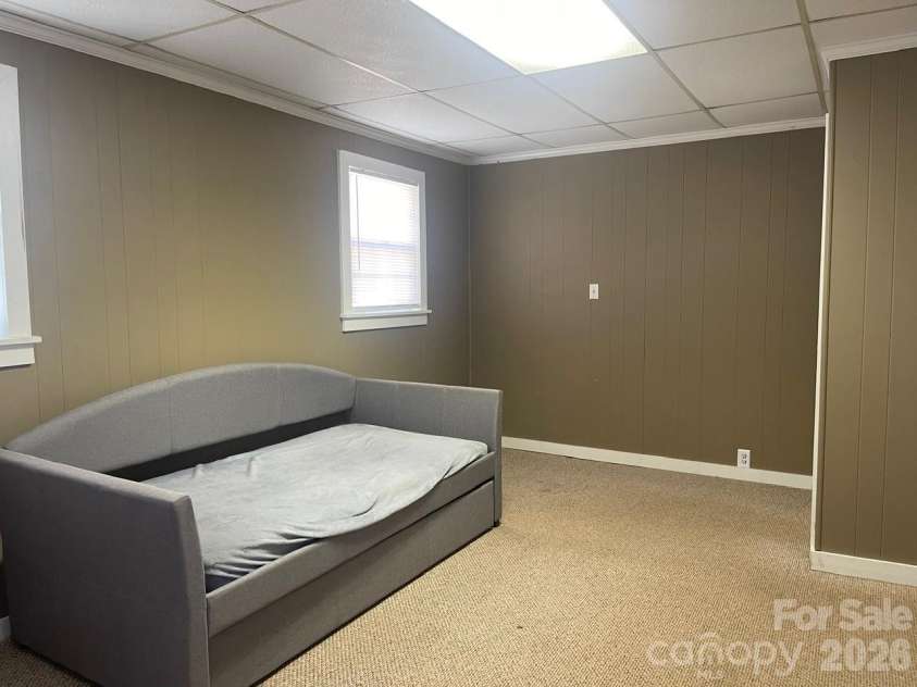 119 Pine Street, Badin, NC 28009.  MLS# CAR4374357, YatesRealty ID 17177. Second Bedroom