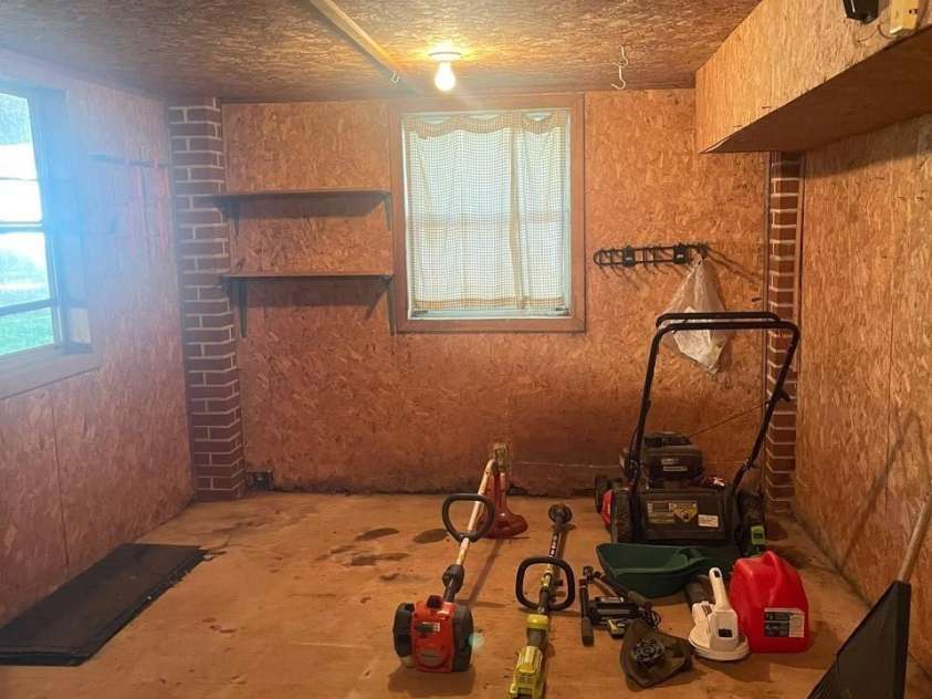 119 Pine Street, Badin, NC 28009.  MLS# CAR4374357, YatesRealty ID 17177. Storage Area Under The House
