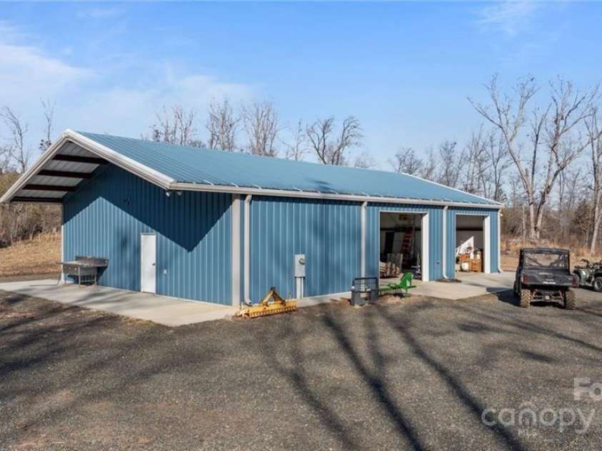 2117 Slate Mine Road, Denton, NC 27239.  MLS# CAR4220730, YatesRealty ID 17181. 2500 sq foot insulated (R-13) Renegade steel building (built in 2016) with 3 commercial garage door entries
