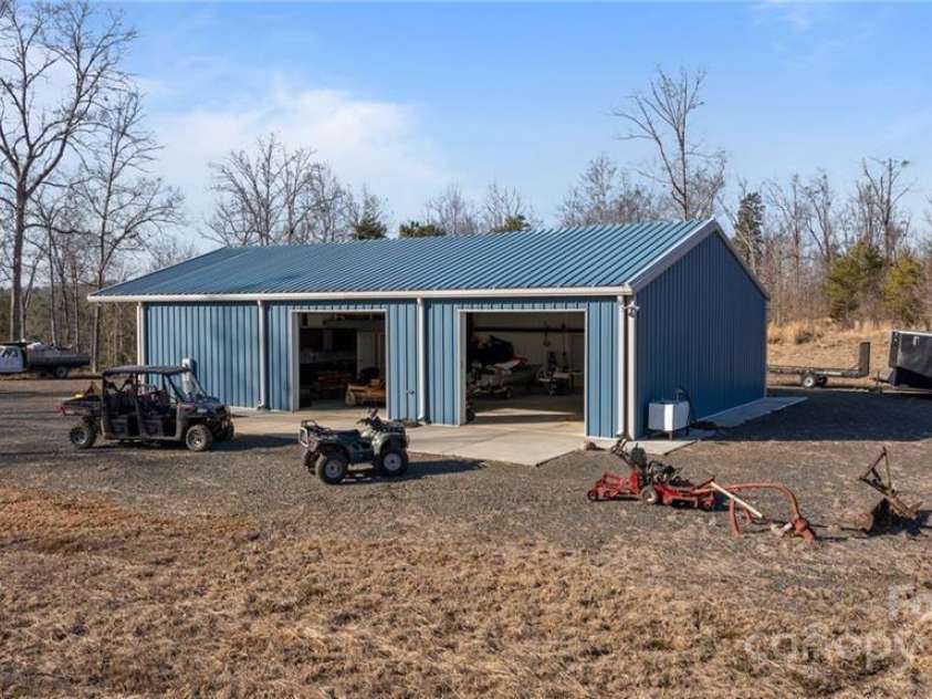 2117 Slate Mine Road, Denton, NC 27239.  MLS# CAR4220730, YatesRealty ID 17181. 2500 sq foot insulated (R-13) Renegade steel building (built in 2016) with 3 commercial garage door entries