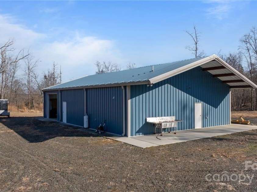 2117 Slate Mine Road, Denton, NC 27239.  MLS# CAR4220730, YatesRealty ID 17181. 2500 sq foot insulated (R-13) Renegade steel building (built in 2016) with 3 commercial garage door entries