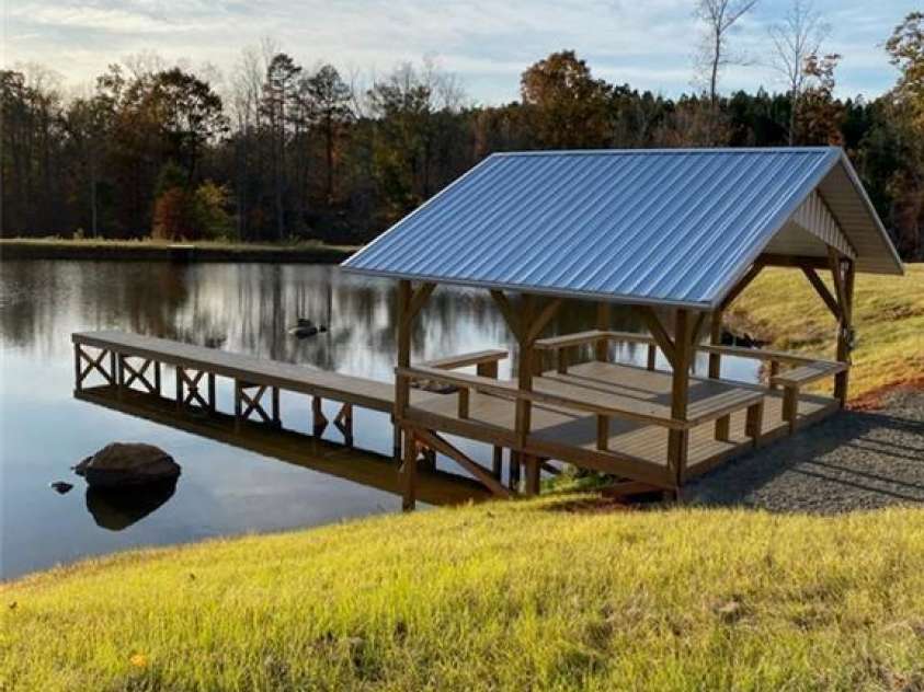 2117 Slate Mine Road, Denton, NC 27239.  MLS# CAR4220730, YatesRealty ID 17181. Pavilion 20x16 with pier (built in 2020) on the large pond