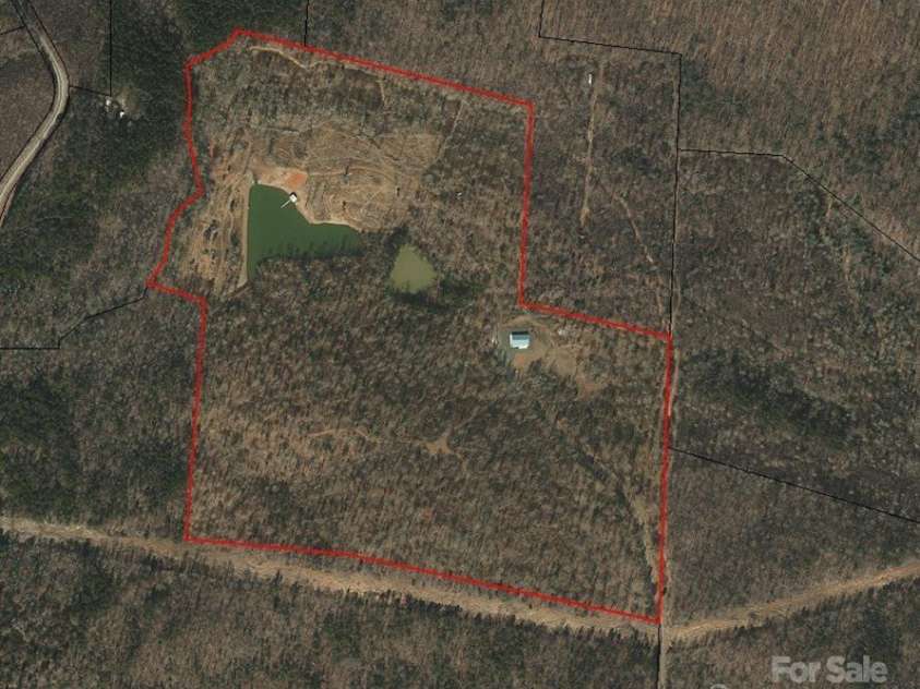 2117 Slate Mine Road, Denton, NC 27239.  MLS# CAR4220730, YatesRealty ID 17181. Rock piles and formations throughout the land.