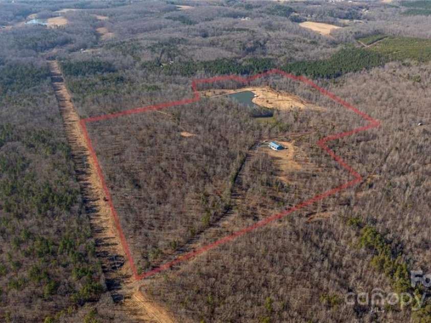 2117 Slate Mine Road, Denton, NC 27239.  MLS# CAR4220730, YatesRealty ID 17181. Rough estimate on properties lines.  Note the powerline to the left.  The bottom corner is approximately around the posted sign in the next pic for reference.